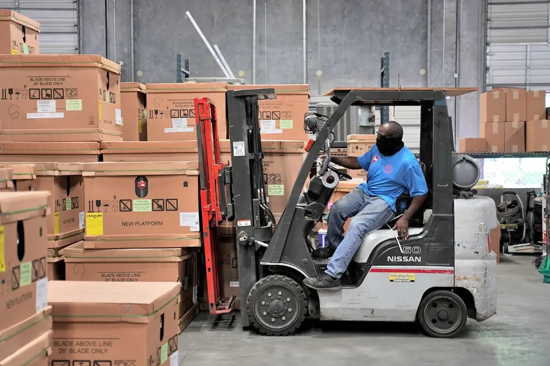 Warehouse — forklift and stocked equipment