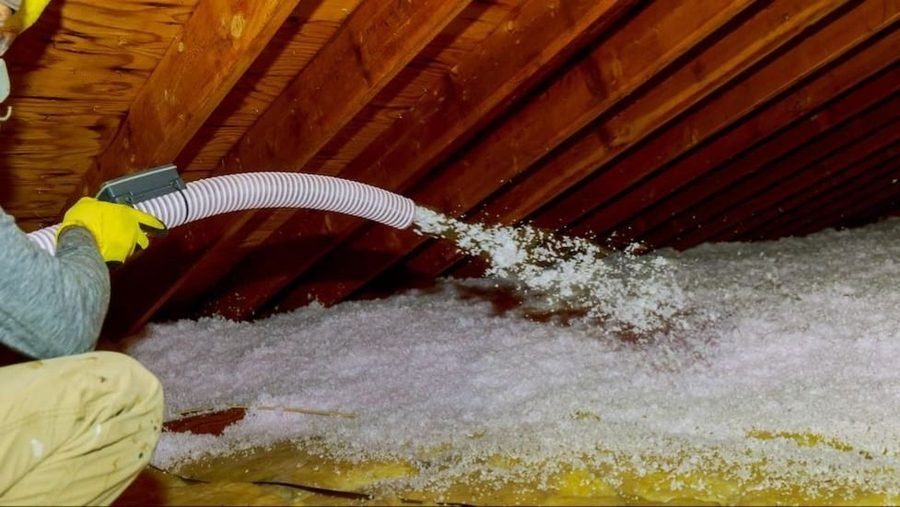 Spraying attic insulation